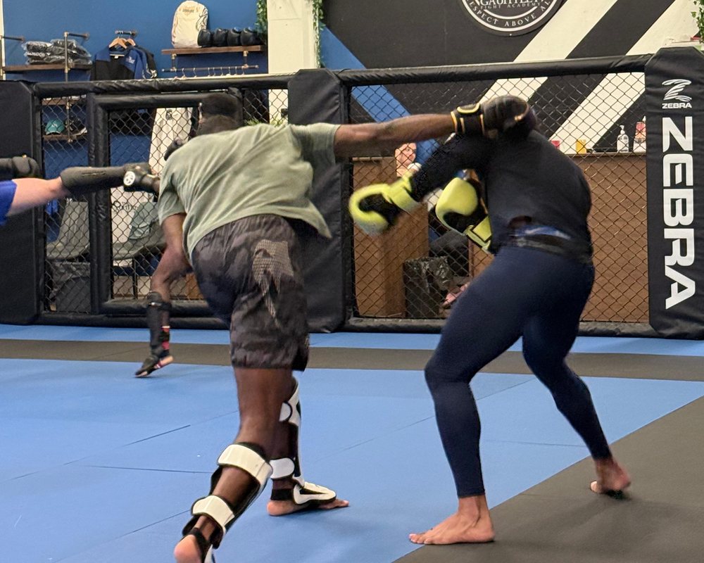A cross landing during sparring